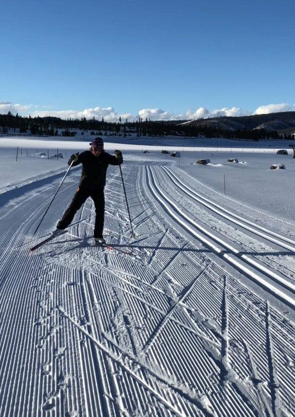 Cross-country skier enjoying freedom of movement on a snowy trail in Pagosa Springs — possible when you move with ease and be your best self
